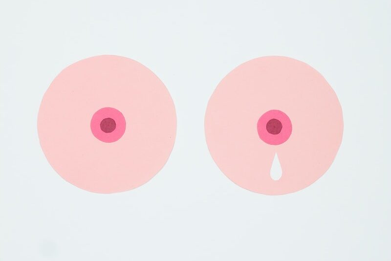 An Illustration of Milk Leaking on the Breast